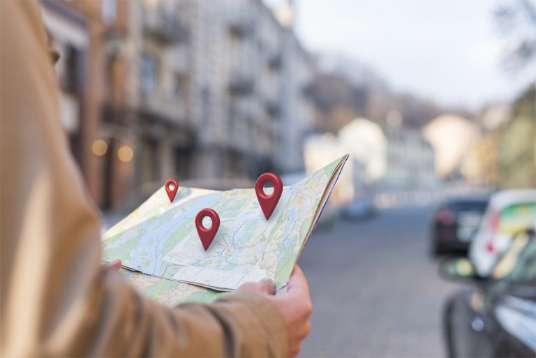 side-view-hands-holding-map